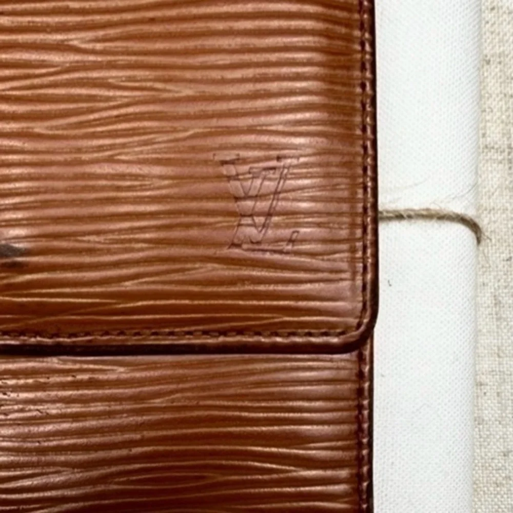 AUTHENTIC Louis Vuitton Marco Wallet. Color: Brown
